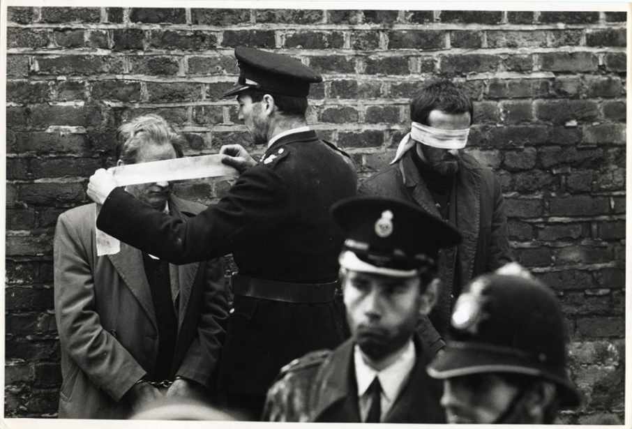 Police blindfold looters before shooting them in The War Game