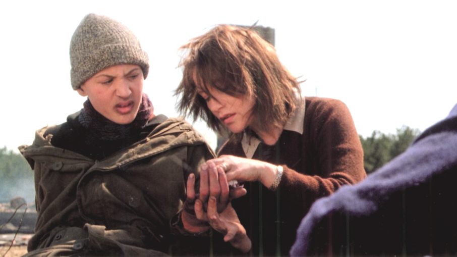 Lucas Biscombe and Isabelle Huppert in Time of the Wolf