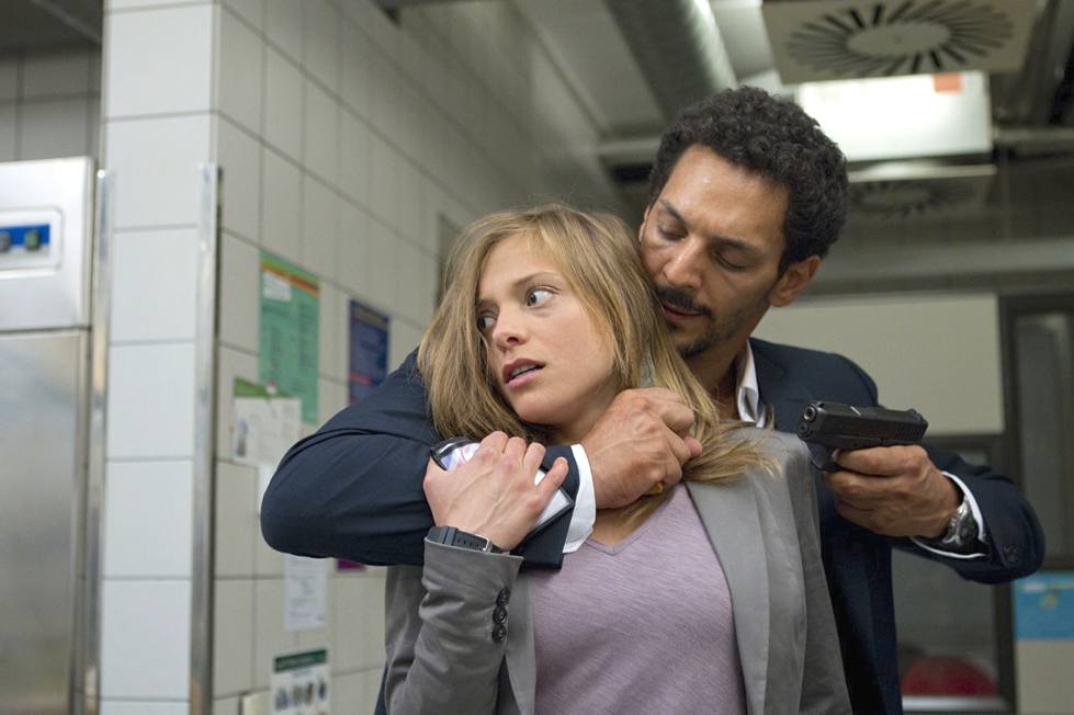 Tomer Sisley and Lizzie Brocheré in Sleepless Night