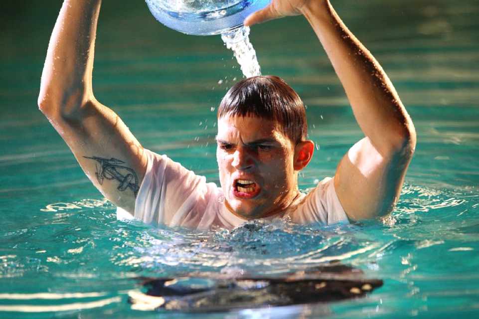 Ashton Kutcher in the swimming pool in The Guardian