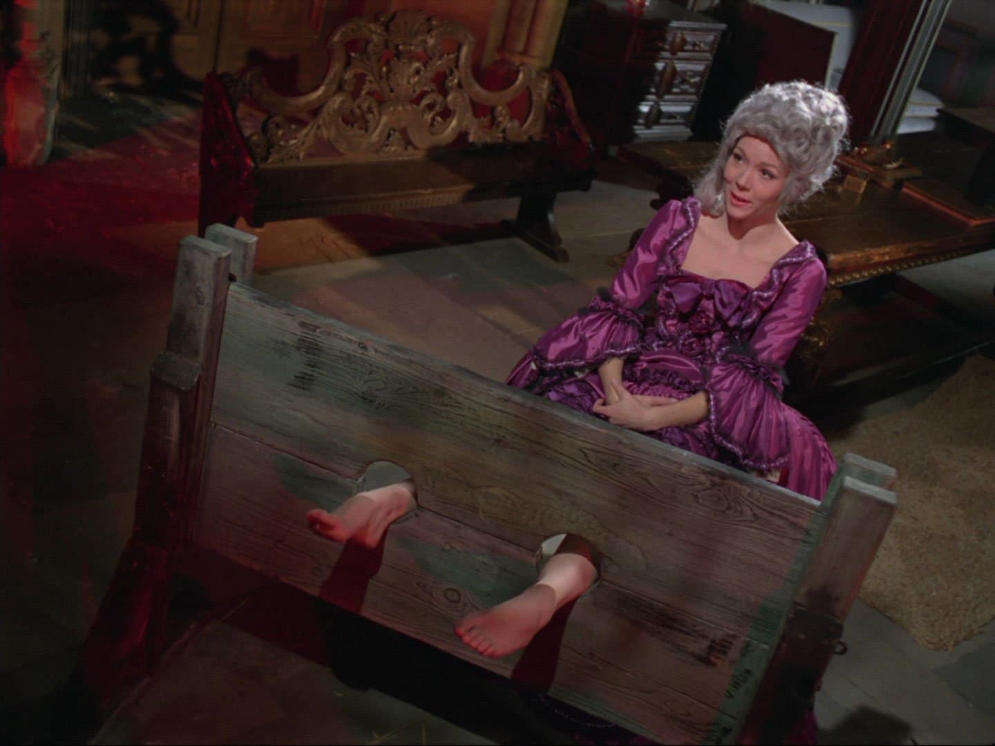 Emma Peel in the stocks