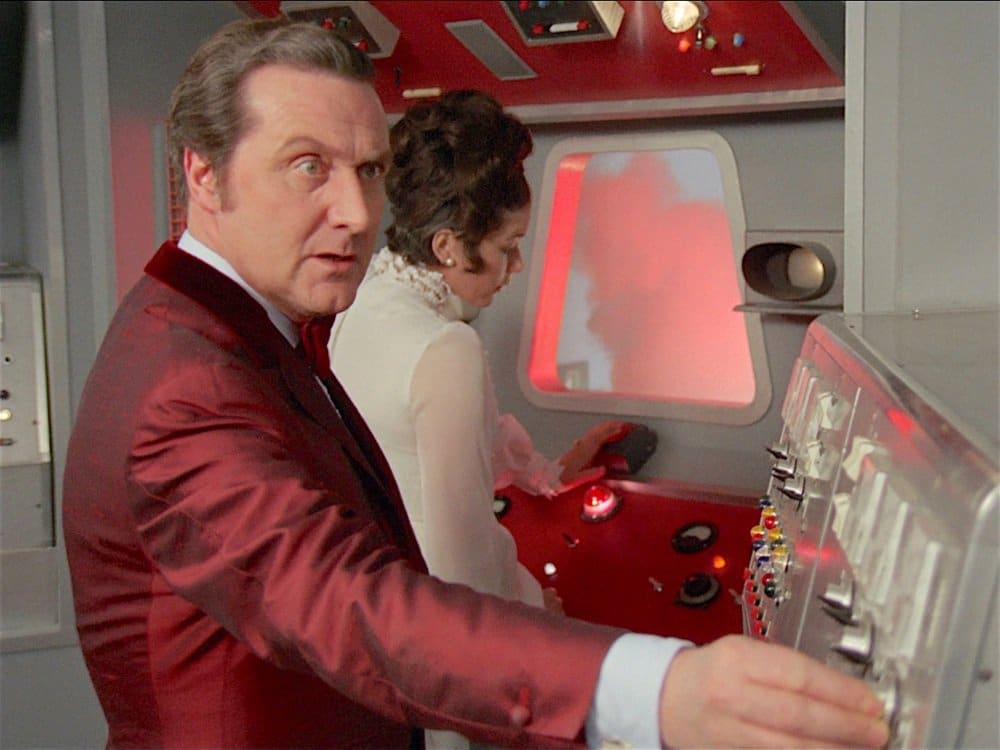 Steed and Tara in a Saturn V rocket