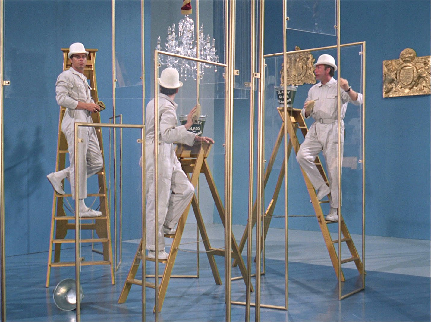 Window cleaners in white bowler hats and overalls