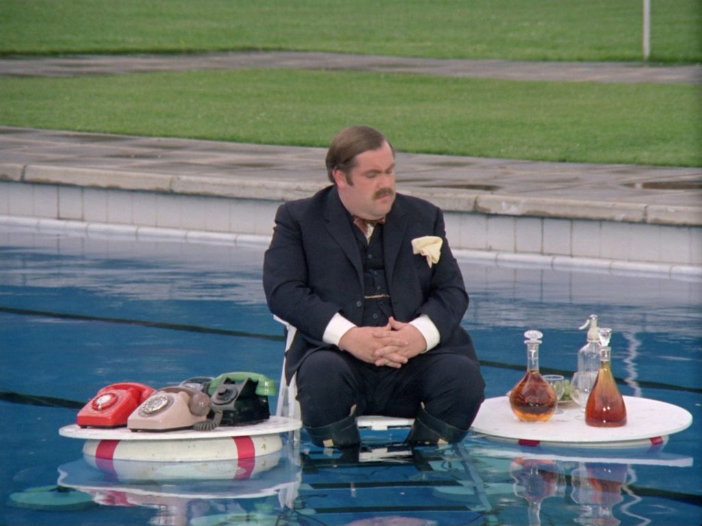 Mother afloat in the pool