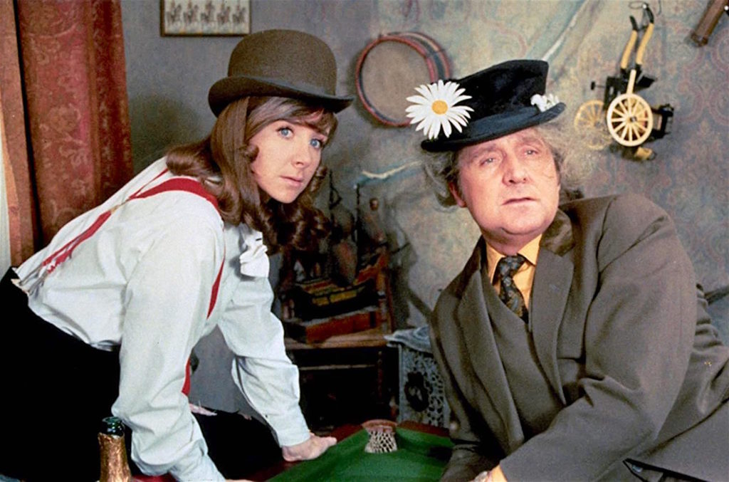 Miranda and Steed wear each other's hats