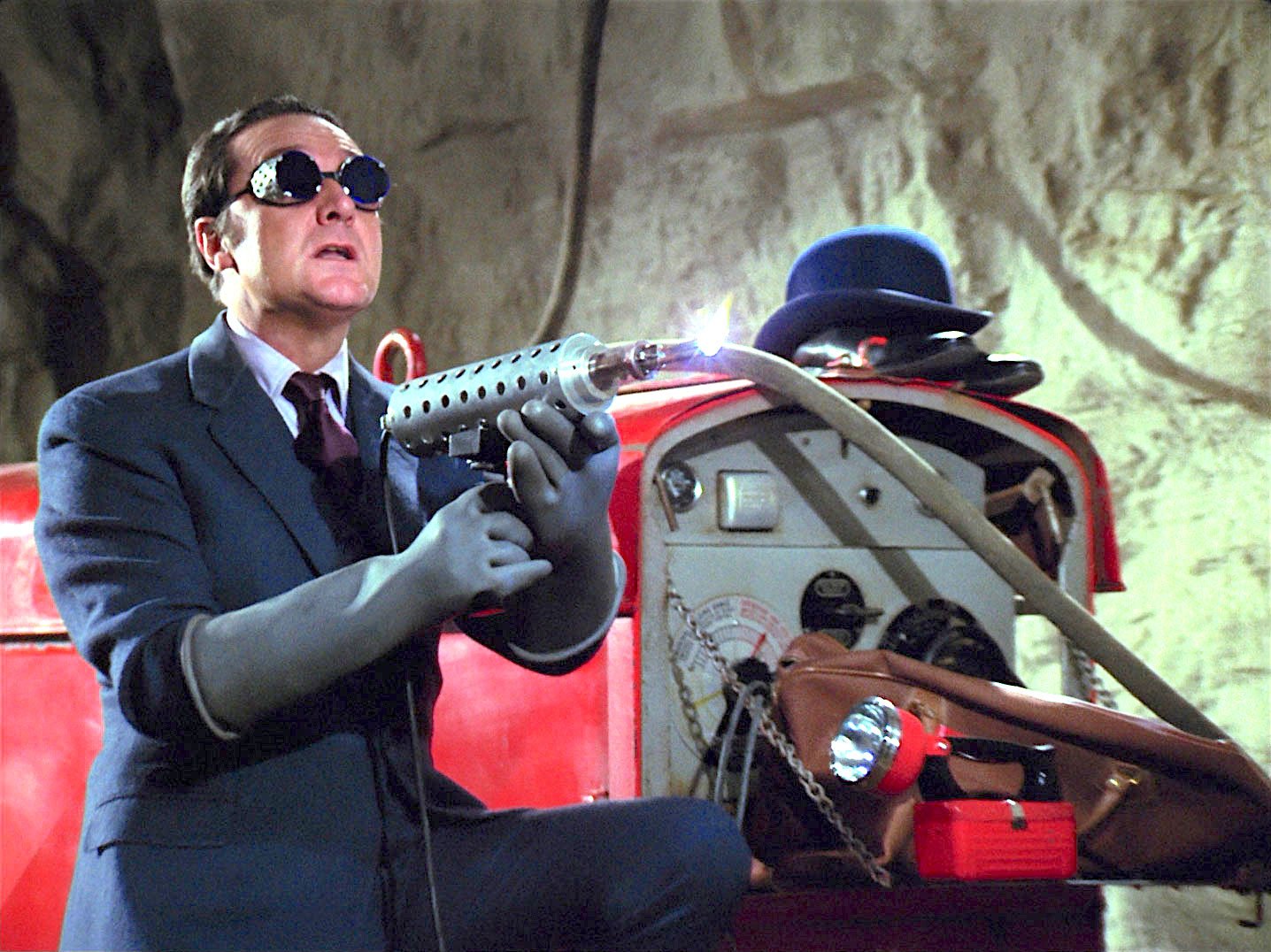 John Steed in a pair of welder's goggles